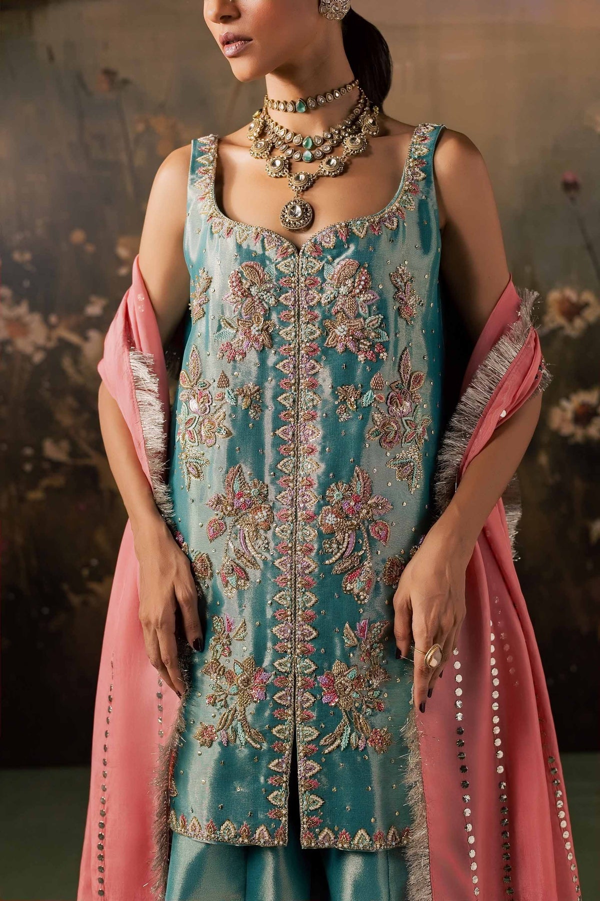 Close-up of hand embroidery on the Firouzeh kurta featuring French knots, pearls, sequins, and kora dabka florals