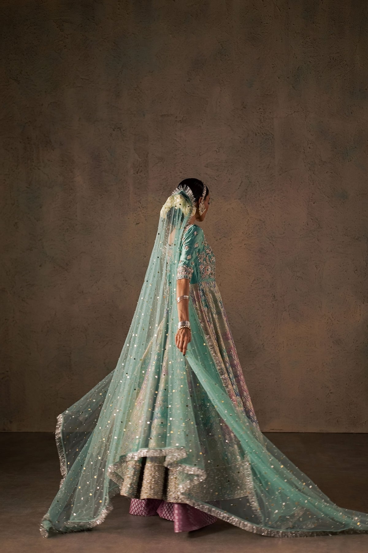 Zonaira Ahmed Gulrukh teal wedding formal 3-piece – back three-quarter walking view with the veil flowing
