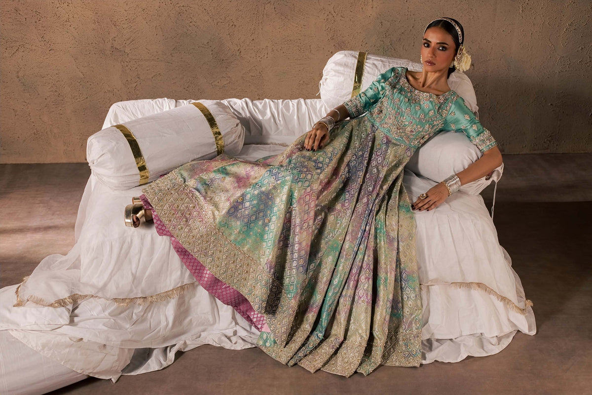 Zonaira Ahmed Gulrukh teal wedding formal 3-piece – reclined lifestyle shot on a draped daybed