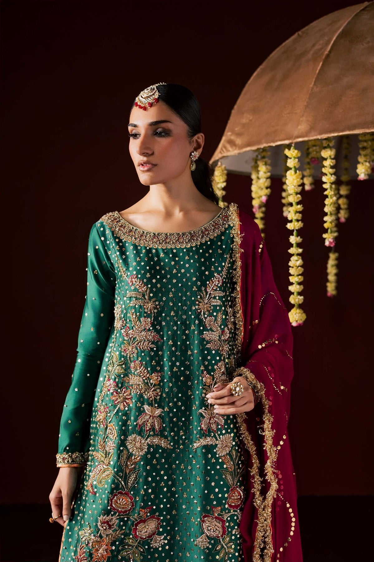 Zonaira Ahmed Haya emerald green maroon wedding formal 3-piece – portrait with bridal jewelry and umbrella prop