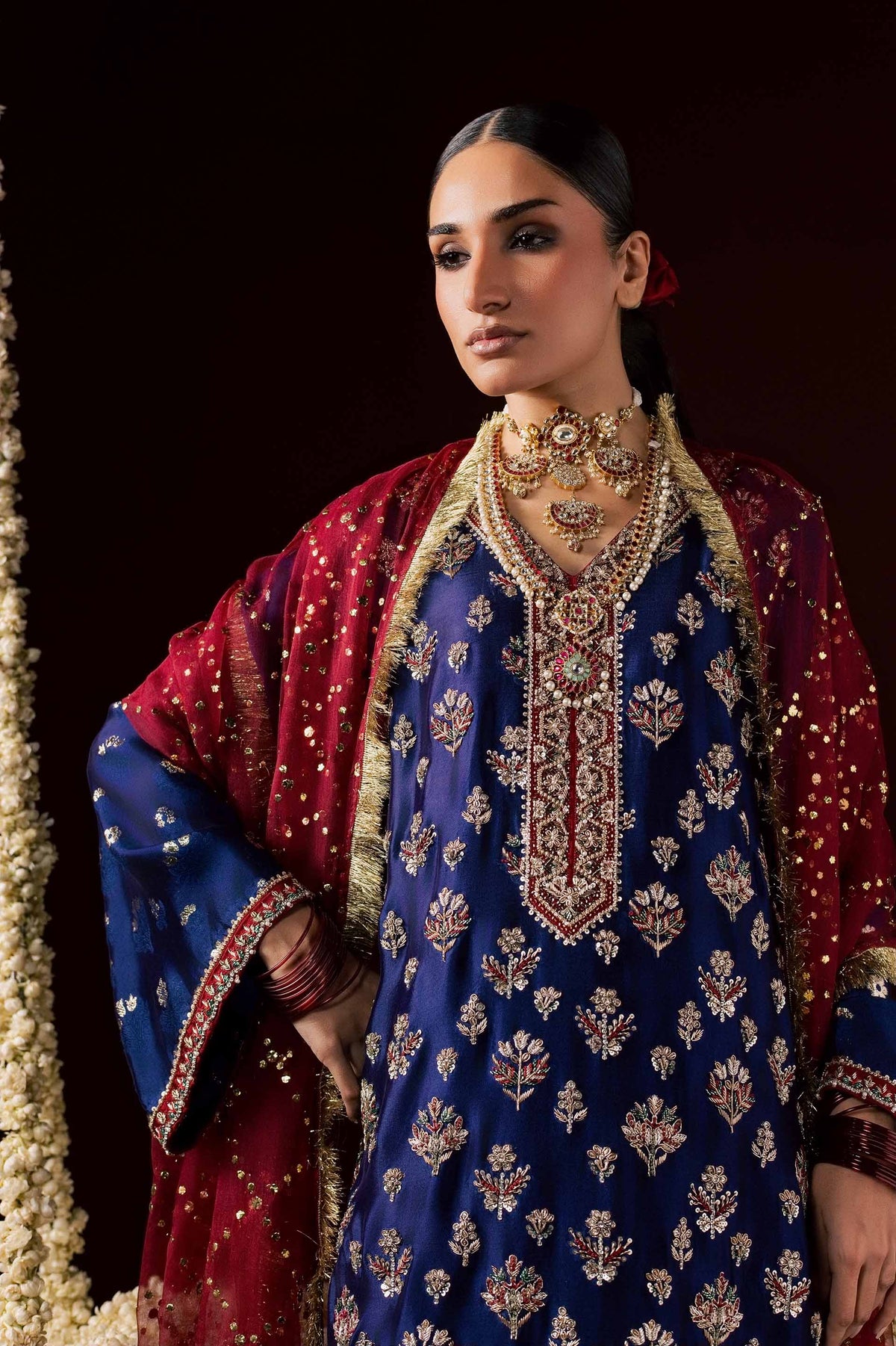 Zonaira Ahmed Nayab navy blue wedding formal 3-piece – neckline and jewelry detail with gold and silver floral embroidery and red dupatta