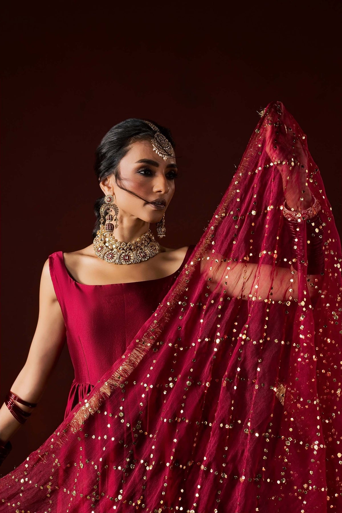 Zonaira Ahmed Neysa maroon wedding formal peshwas – close-up dupatta flourish showing the mukesh sequin scatter pattern and kiran lace border
