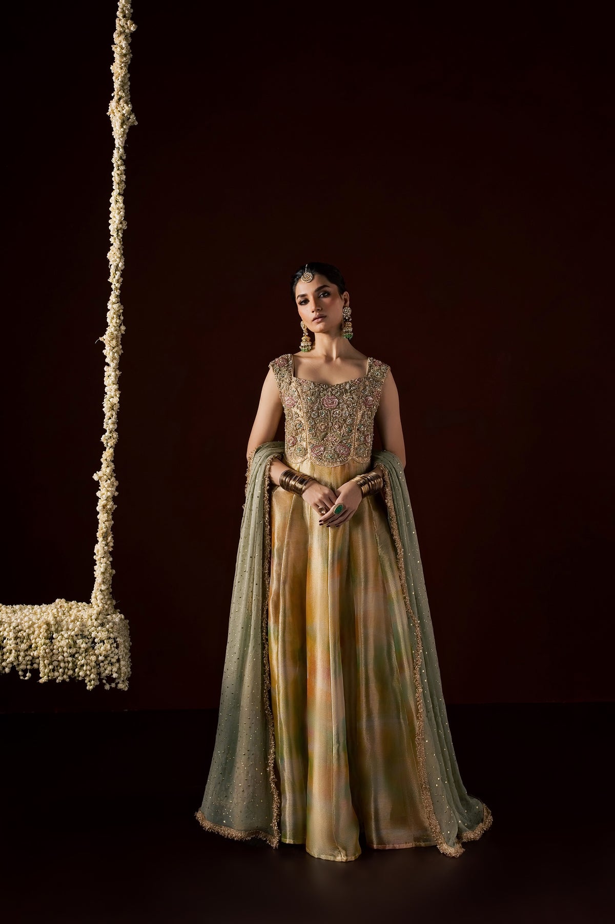 Zonaira Ahmed Nooré gold ombre wedding formal 3-piece – front view with hands clasped, sage dupatta draped over both shoulders