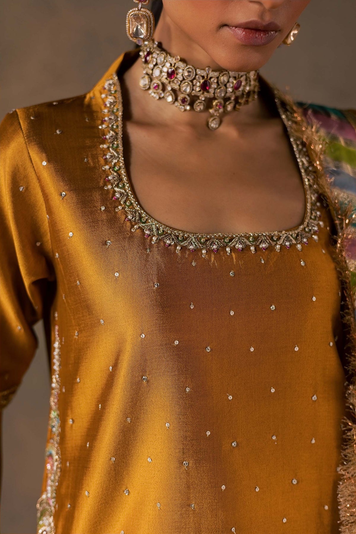 Zonaira Ahmed Zarmin mustard wedding formal 3-piece – close-up of embellished neckline and choker jewelry detail